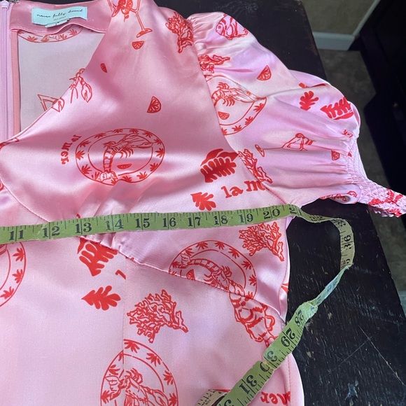 Never Fully Dressed
Pink La Mer May Midi Dress Size 14. - Picture 12 of 16